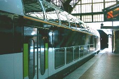 Double-decker coach photographed in Copenhagen 29. January 2004.  DSB leased 67 coaches by Bombardier Transportation in 2003 for a 4 years period. Max. speed 160 km/h - 100 mph. Length: 26 800 mm.